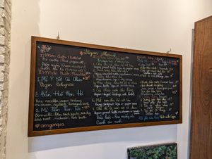 Daily menu on chalkboard at Mang's Mania in Ho Chi Minh City