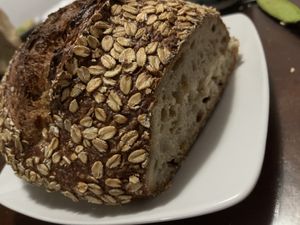 Pan De avena (40% integral: trigo germinado, avena, hojuelas de avena)  at El Pan De La Chola in Lima