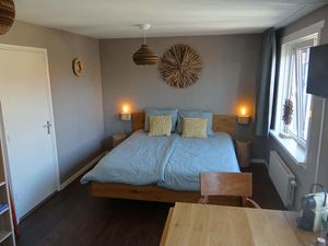 The curtains made from plastic bottles,  biologic cotton on the beds.
Poison free paint on the walls.  at Villa La Vida in Egmond Aan Zee