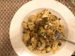 Vegan fettuccine with cauliflower, pepper, capers, sunflower seeds, gremolata at Anya in Thompson