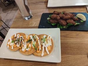 Okonomiyaki y hēura rebozada at Roots & Rolls in Barcelona