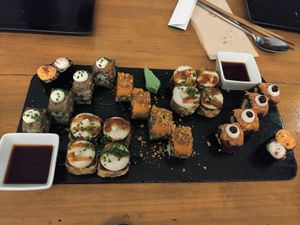 Variety sushi dish at Roots & Rolls in Barcelona