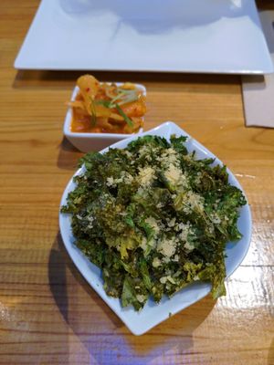 Kale chips and kimchi at Roots & Rolls in Barcelona