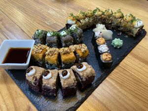 Sushi Tasting (imo the ‘say cheese’ on the top right were the BEST)  at Roots & Rolls in Barcelona