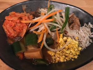 Jackfruit dish with tofu, rice, vegetables & kimchi  at Roots & Rolls in Barcelona