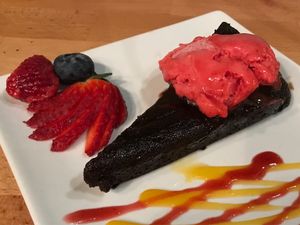 Warm chocolate brownie with raspberry sorbet at Roots & Rolls in Barcelona
