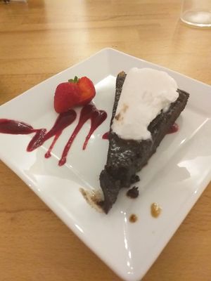 Brownie with coconut ice cream!!! So delish at Roots & Rolls in Barcelona