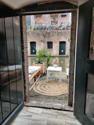 Canal side seating at Loua Juicebar in Utrecht