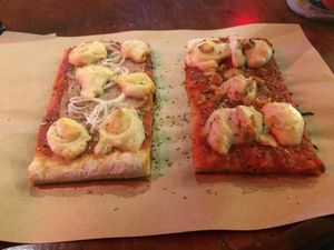 Potato and onion topping on left, different cheeses on right.  at Vicolo1 in Ho Chi Minh City