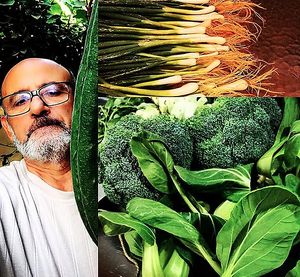 Chief Farmer with lots of garden grown veggies at Formosa Chinese Restaurant in Aqaba