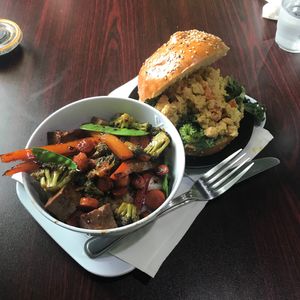 veggie , tofu , and rice noodle bowl and chickpea burger with kale at Tivoni Vegan Kitchen & Bakery in Lancaster