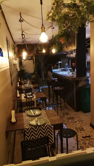 Ours bar with a elegant and green decoration  at Wakanda in Tenerife