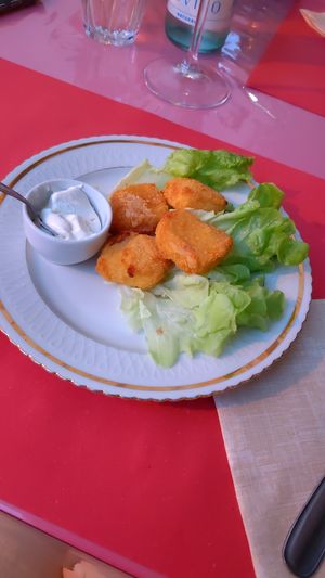 Homemade deep fried vegan mozzarella cheese at Antica Casa Rava in Alessandria