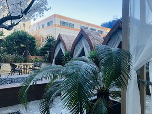 Outdoor seating - there is a balcony as well.  at Doco - City Farm House Cafe in Busan