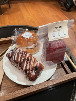 Cinnamon bun, cream bun, rice bread  at Doco - City Farm House Cafe in Busan