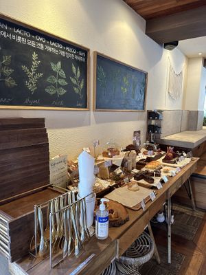 Lacto-ovo and vegan pastries on the table. All labeled  at Doco - City Farm House Cafe in Busan