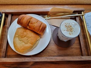 Sunshine Doko drink with pumpkin bread and pastry filled with a soybased cream at Doco - City Farm House Cafe in Busan