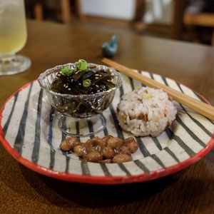 Appetizer plate with rice ball, seaweed and peanut at Itadakizen Colline de Tara in Nagoya