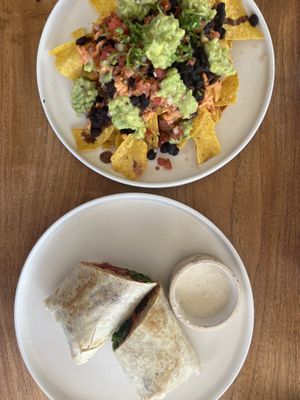 Nachos & Rainbow Wrap - so filling but so delicious!! i recommend both (you have the option of making the nachos spicy to your taste)  at I Am Vegan Babe in Canggu