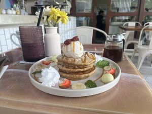 Pancakes with vanilla ice cream and a berry smoothie  at I Am Vegan Babe in Canggu