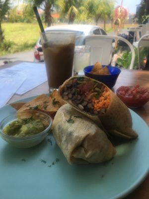Burrito and iced coffee at I Am Vegan Babe in Canggu