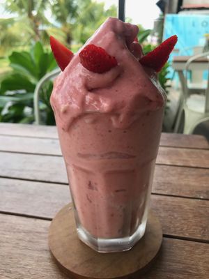 Pink strawberry pineapple smoothie at I Am Vegan Babe in Canggu