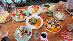 English muffin, Hello Waffles, tofu scramble on toast, mushroom on toast, Uncle Rudy iced Bali coffee, burrito, lime juice, assorted cakes, cinnamon roll, nachos, Power Omelette at I Am Vegan Babe in Canggu