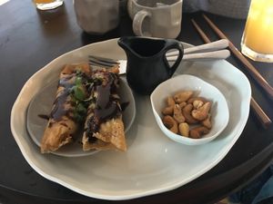 Fried banana with chocolate sauce for desert at Vegan Zone in Hoi An