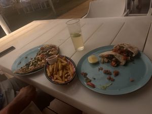 Pizza with vegan cheese, great chips, veggie gyros.   at Mangrove Hotel in Broome