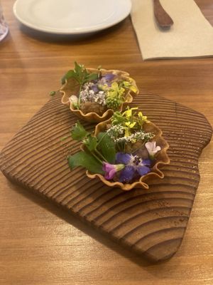 Tart using local foraged flowers and house made shells from old bread  at Hillside Kitchen & Cellar in Wellington