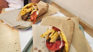 Gyros on corn pita. It has French Fries (or Chips if you're from UK) in it which I found interesting. at Vegan Food Tour Athens in Athens