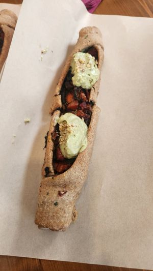 Vegan Peinirli with avocado topping. at Vegan Food Tour Athens in Athens