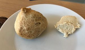 Samosa served with a dollop of hummus   at Henny's HomeMade in Amsterdam