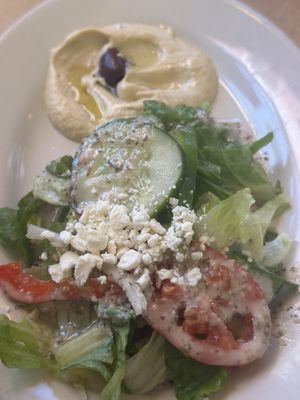 Greed salad and hummus side that came with Vegetarian Falafel Plate   at Petra Cafe in Hattiesburg