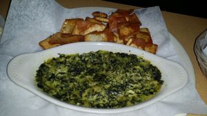 Spinach Artichoke Dip with Fried Pita Bread at Petra Cafe in Hattiesburg