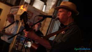 Pic of a musician performing at Sanctuary Brewing and he happens to be vegan  at Neofilm in Shelby