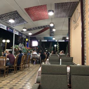 Side terrace dining area at Karimbek in Samarkand
