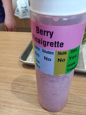 Salad dressings are marked vegan or not on the bottle. at Giardino Gourmet Salads in Naples