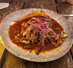 Vegetarian aguachile - mushroom, pickled onion, zucchini, amazing sauce and tostadas at Barba Negra in Holbox