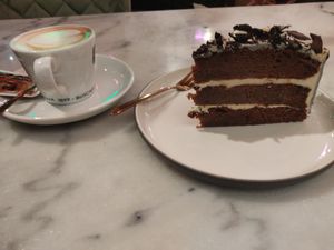 Chocolate cheesecake and coffee at Happy Food and Health  in Rotterdam