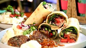 Wrap with veggie koftes with Turkish rice on the side.  at Happy Food and Health  in Rotterdam
