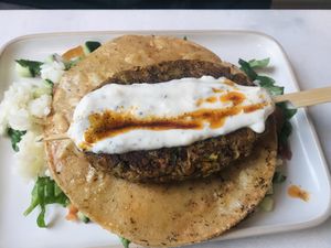 Tortilla Kebabi with rice and garlic sauce  at Happy Food and Health  in Rotterdam