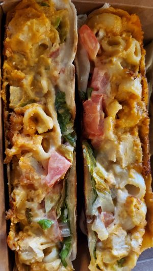 buffalo chicken and mac n cheese crunchwrap at Leguminati Vegan Eatery in Orlando