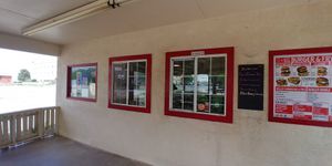 Facing order window inside seating area at Chef Toddzilla in Roswell