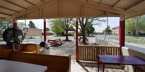 Facing uncovered seating area near where you pull in at Chef Toddzilla in Roswell