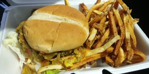 Impossible burger, added green chilis, no cheese, no mayo, with fries. The fries are seasoned and a bit salty at Chef Toddzilla in Roswell