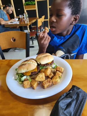 Cheeseburger sliders with potato wedges at Binge Kitchen in San Antonio