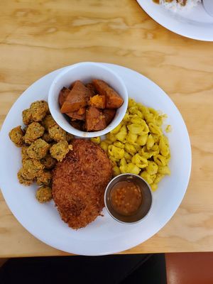 Coconut crusted chick'n with Mac and cheese, fried okra and candied yams at Binge Kitchen in San Antonio