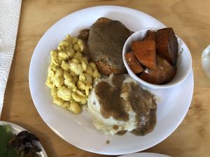 ‘Meatloaf’  mac n cheese, mashed potatoes, candied yams at Binge Kitchen in San Antonio