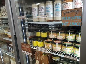 Vegan dairy items at Scoop Wholefoods in Orange